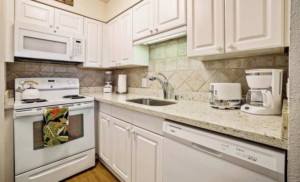 Nicely updated kitchen with quartz countertops 