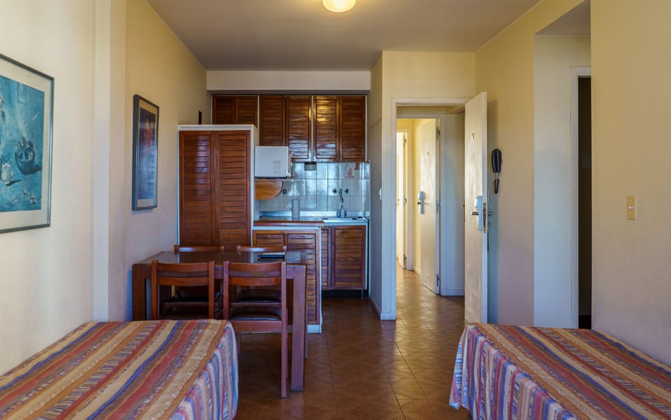 Standard Apartment | Living area | 32-inch TV with cable channels