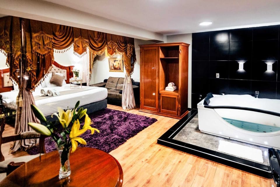 Deluxe Suite, Garden View | In-room safe, free WiFi