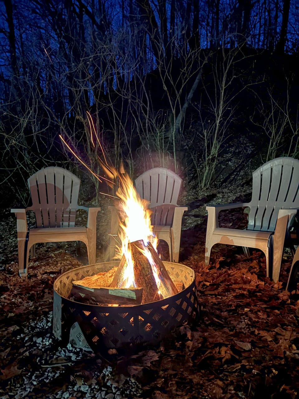 Keep warm around the fire pit and enjoy the night sky