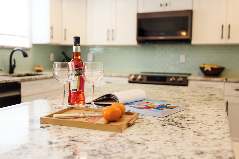 Kitchen island with 2 stools.