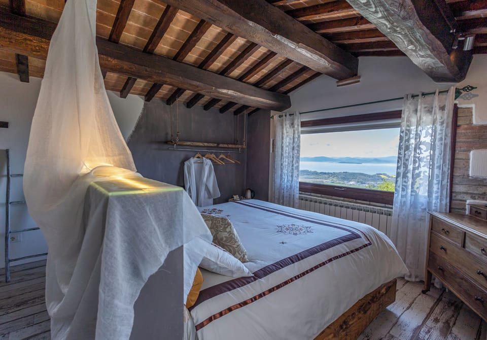 Room, 1 Queen Bed, Lake View | Frette Italian sheets, premium bedding, down comforters, minibar