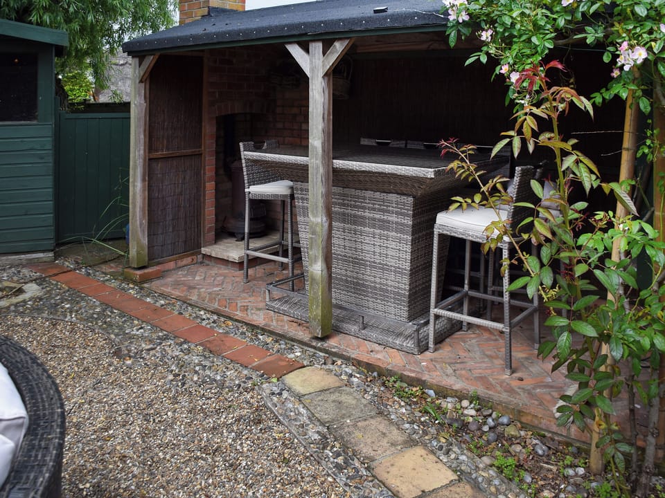 Outdoor area | Capri Cottage, Winterton-on-Sea