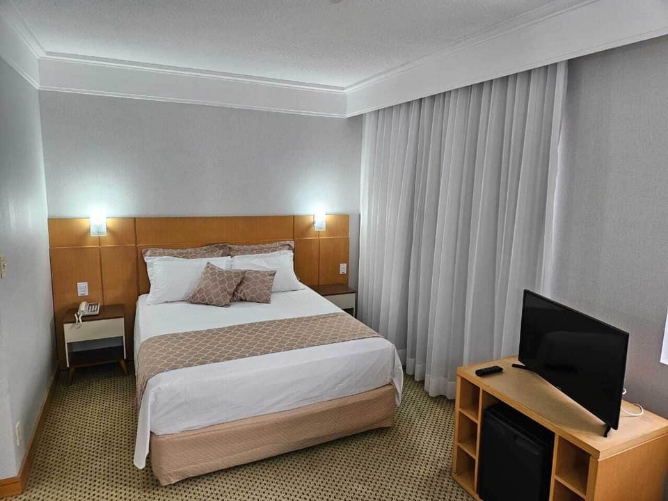 Deluxe Room, City View | Minibar, individually furnished, desk, laptop workspace