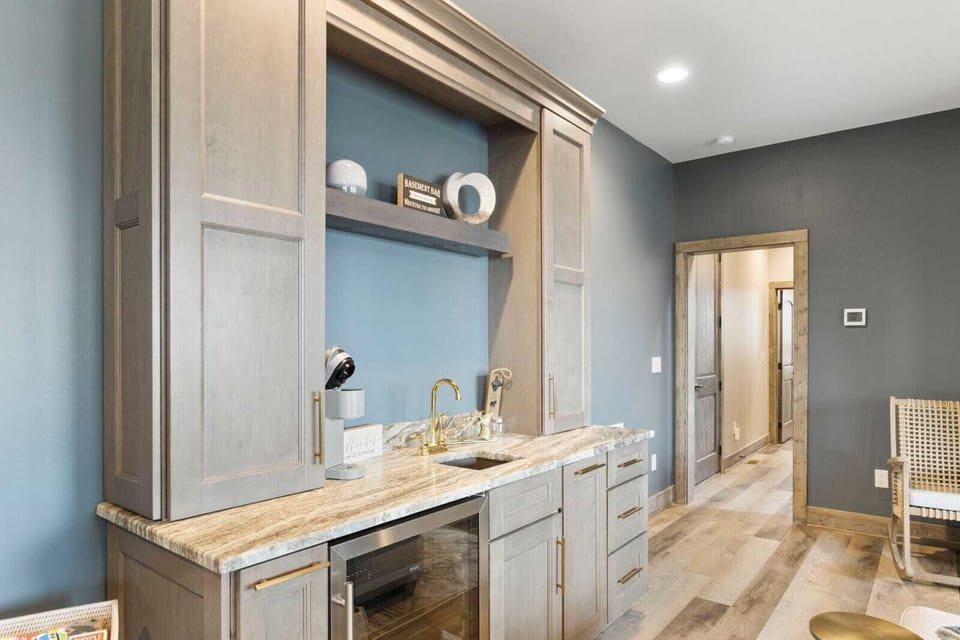 Mini Kitchen in the Lower Level with Wine Chiller and Sink