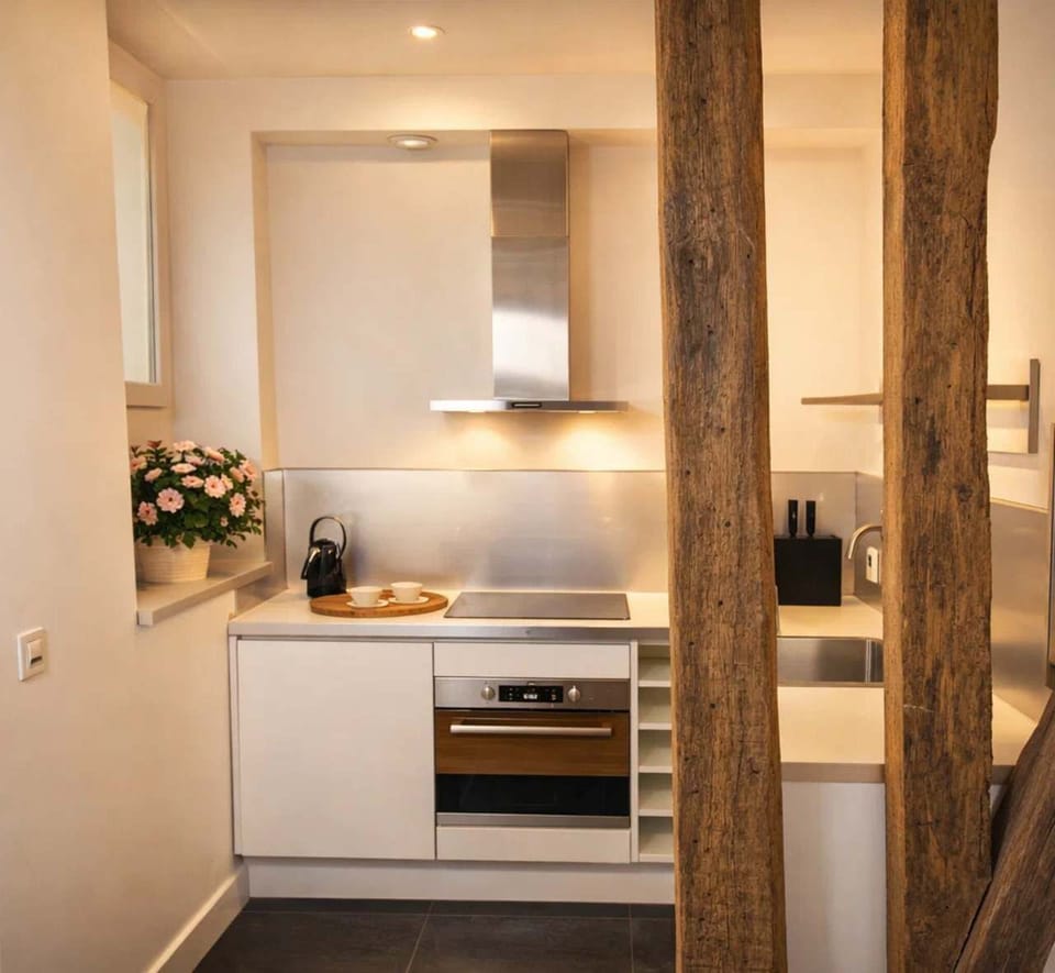 The kitchen comes with everything you need for a convenient and delightful stay.