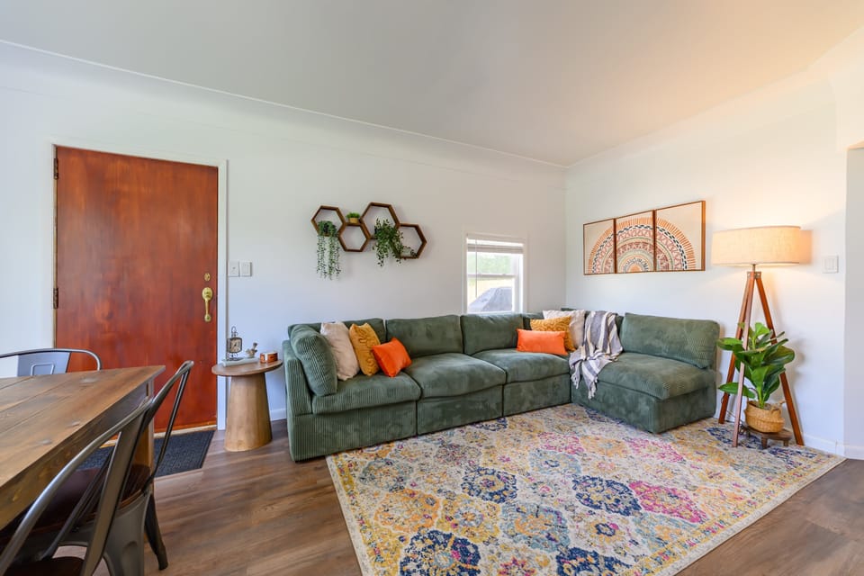 Living room with electric fireplace and roku smart tv. 