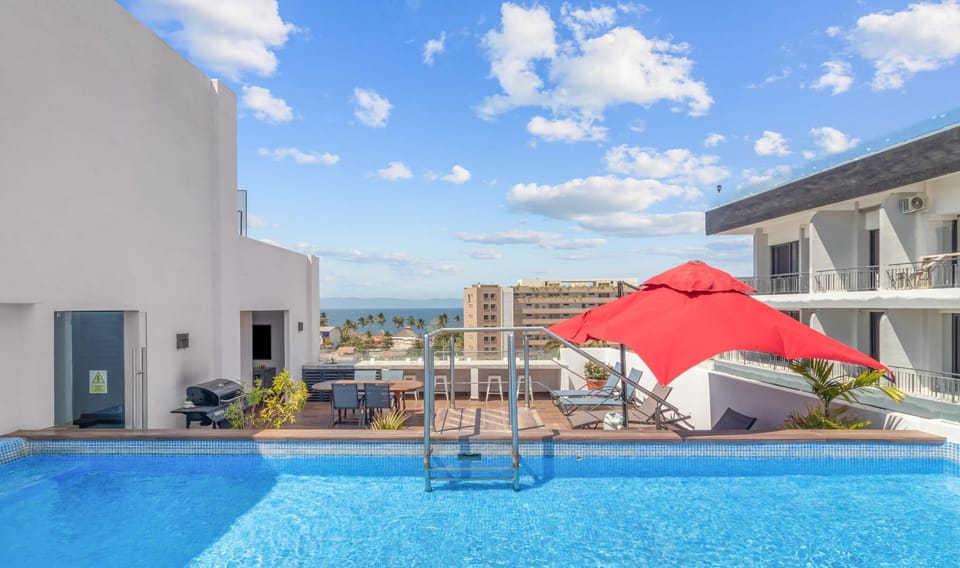 Shared rooftop with shallow pool, grill, and 360 views of Bucerias and the beach!
