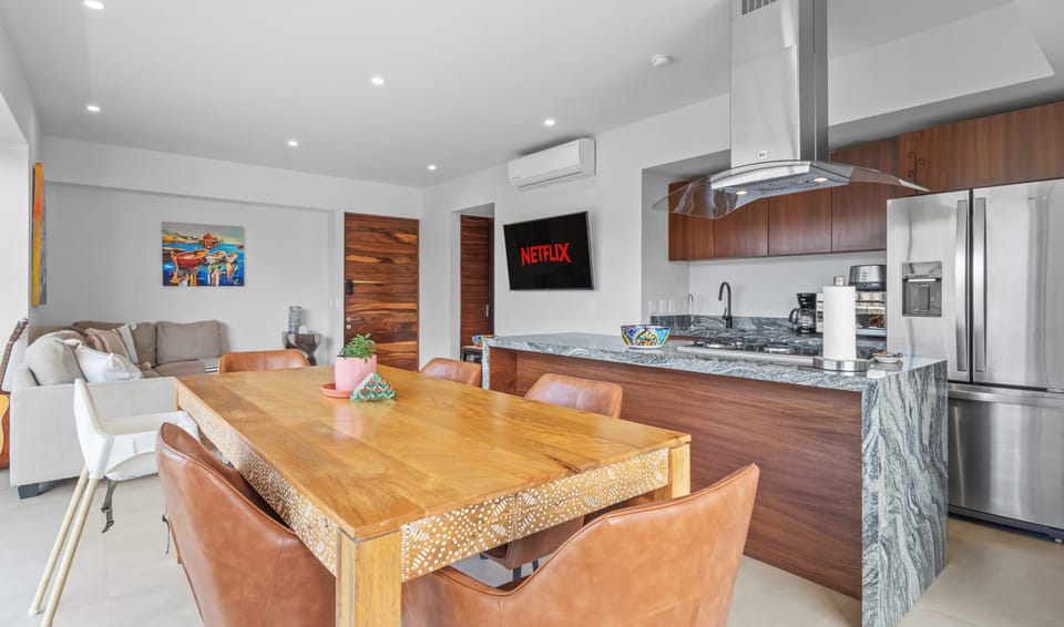 Dining table and Fully equipped kitchen