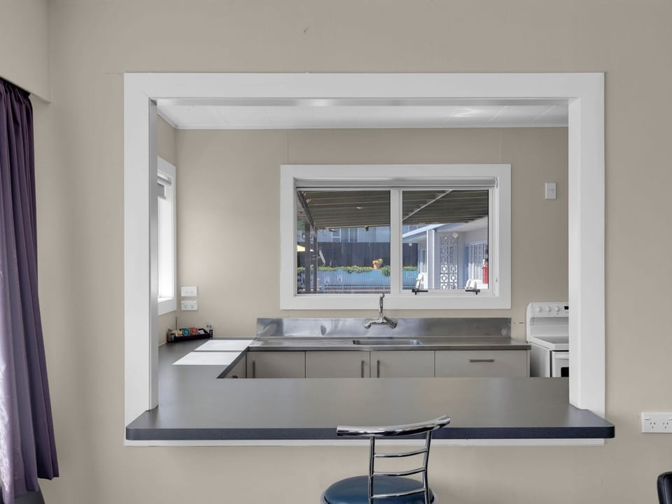 Premium Suite | Desk, blackout drapes, iron/ironing board, free WiFi