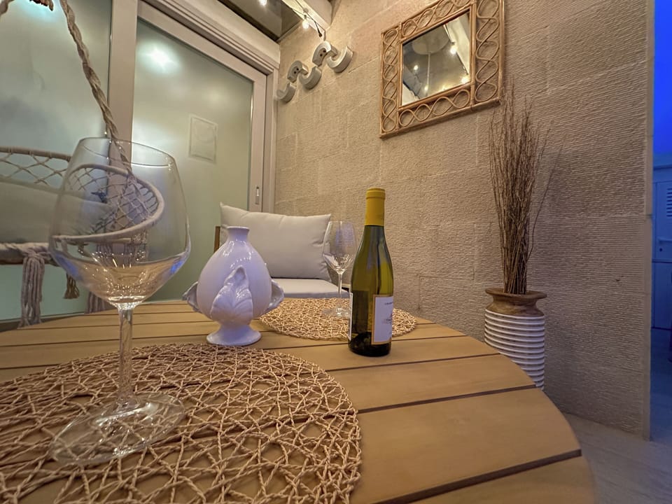 Deluxe Double White Room, City View | Balcony