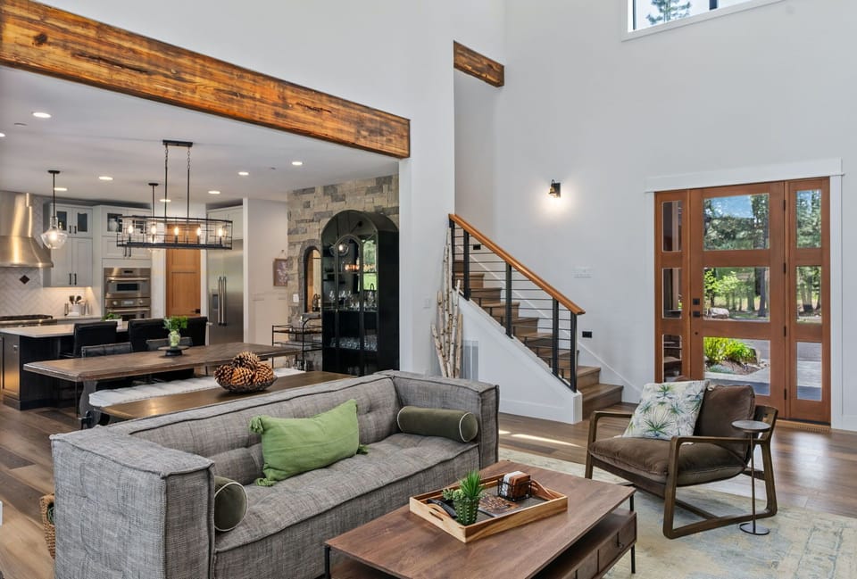 Living Room –Open Concept Entry, Chef’s Kitchen + Formal Dining for Eight + Plush Sofa