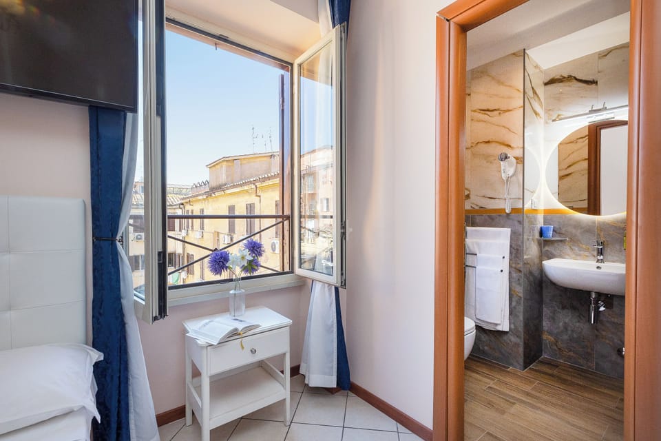Twin Room (2 Single Beds) | Bathroom | Shower, free toiletries, hair dryer, towels