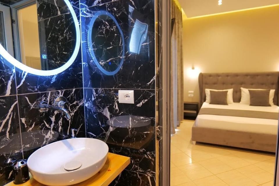 Deluxe Quadruple Room, Balcony, Lake View | Blackout drapes, WiFi (free), bed sheets