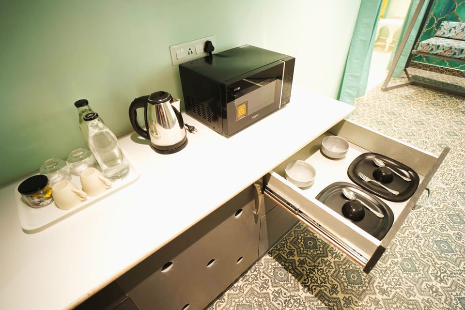 Morocco Suite with Jacuzzi | Private kitchen | Coffee/tea maker, electric kettle