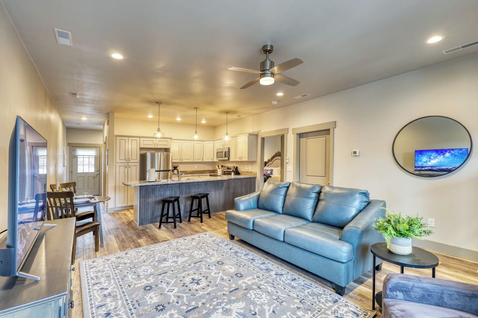 Our open-concept condo fosters relaxation with interconnected living, dining, and kitchen areas, offering space to unwind and move freely.