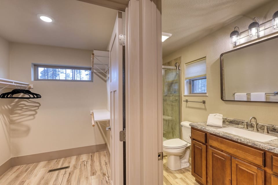 There is no need to share bathrooms!  The second bedroom also has its own en suite bathroom.  If you still need more bathroom space, there is a half bath on the main floor!

Closet space will not be an issue in The Washington Condo!  The second bedroom boasts this generous sized walk-in closet. 
