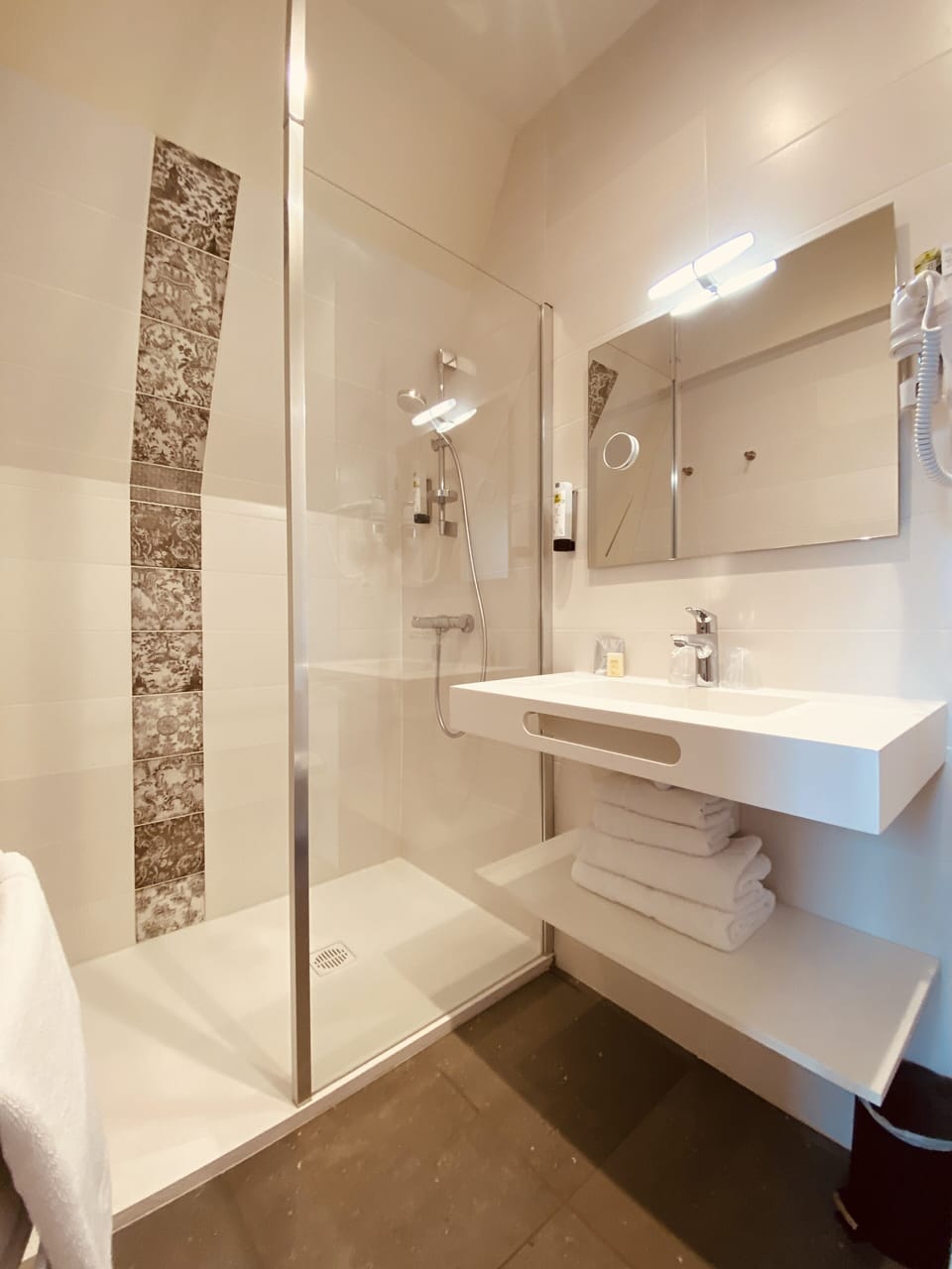 Shower, free toiletries, hair dryer, towels