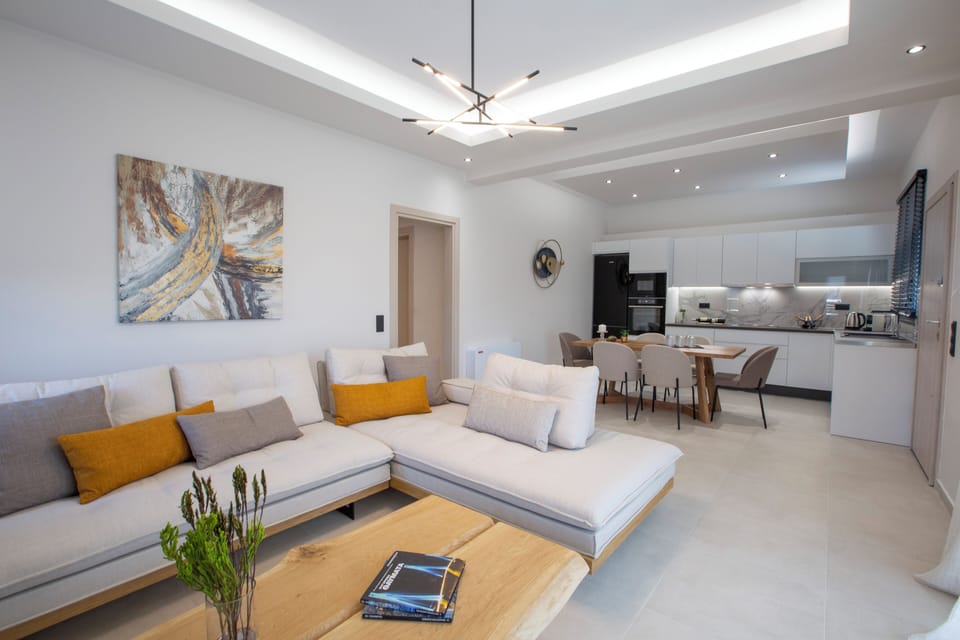 Suite, Private Pool | Living area | 50-inch LED TV with premium channels