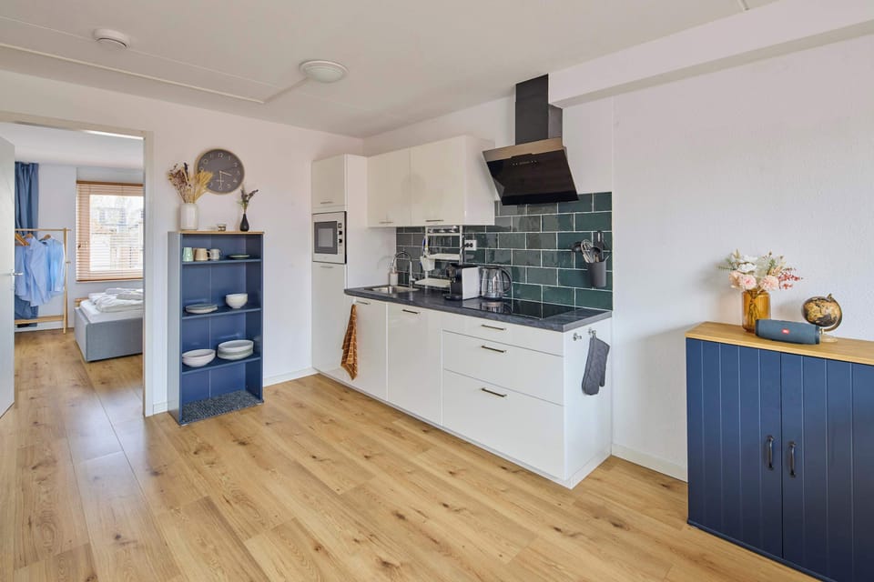 Fully equipped kitchen with everything needed for cooking during your stay.