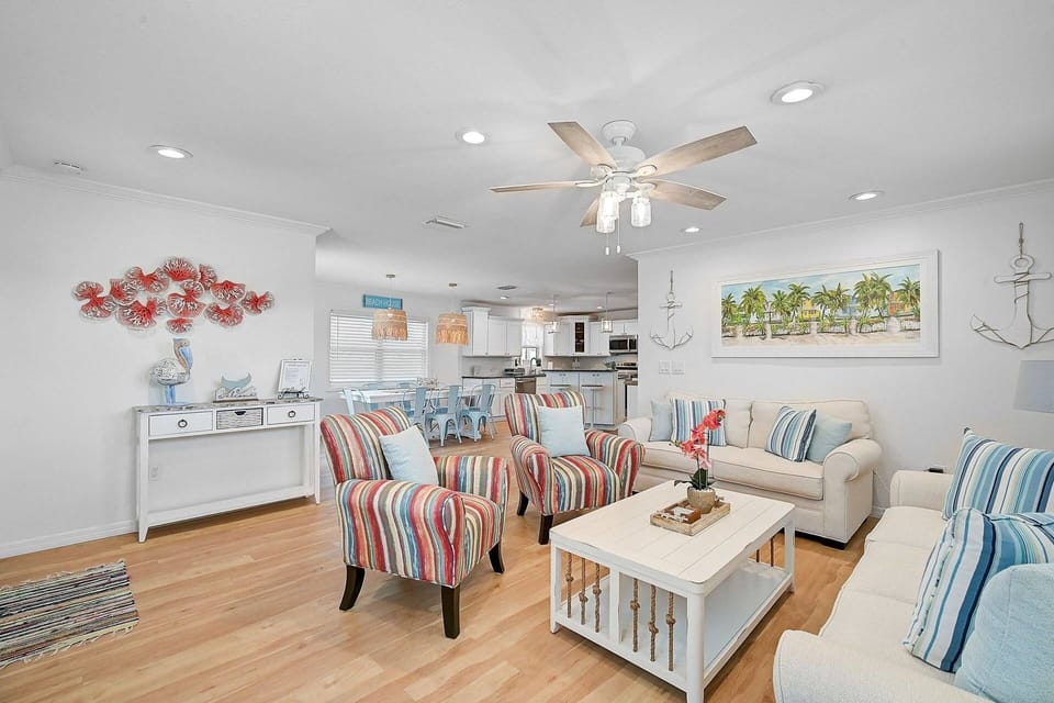 The light and bright living room is the perfect spot to relax, recharge, and enjoy your time away