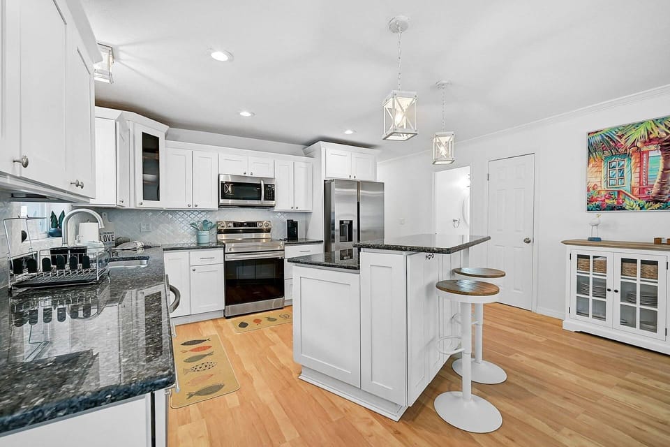No expense was spared in this fully stocked kitchen — equipped with everything you need to cook, entertain, and enjoy your stay,