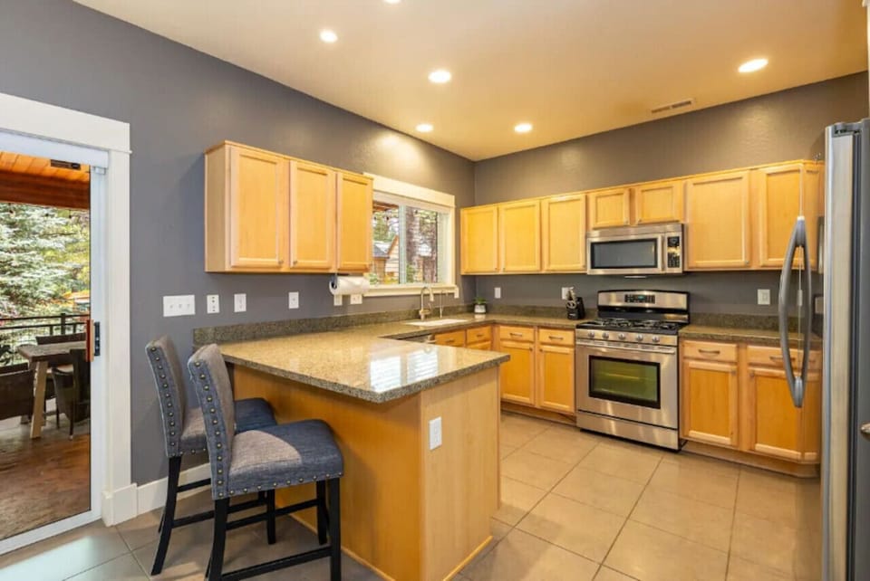 The kitchen has everything you need from dishware to stainless steel appliances. Feel at home during your stay!