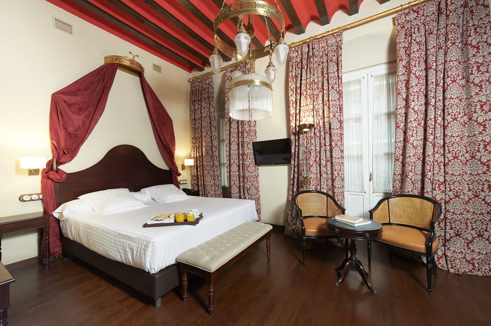 Deluxe Plus Room | Minibar, in-room safe, individually furnished, desk