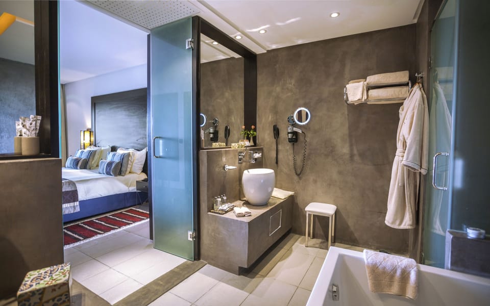 Eco-friendly toiletries, hair dryer, bathrobes, slippers