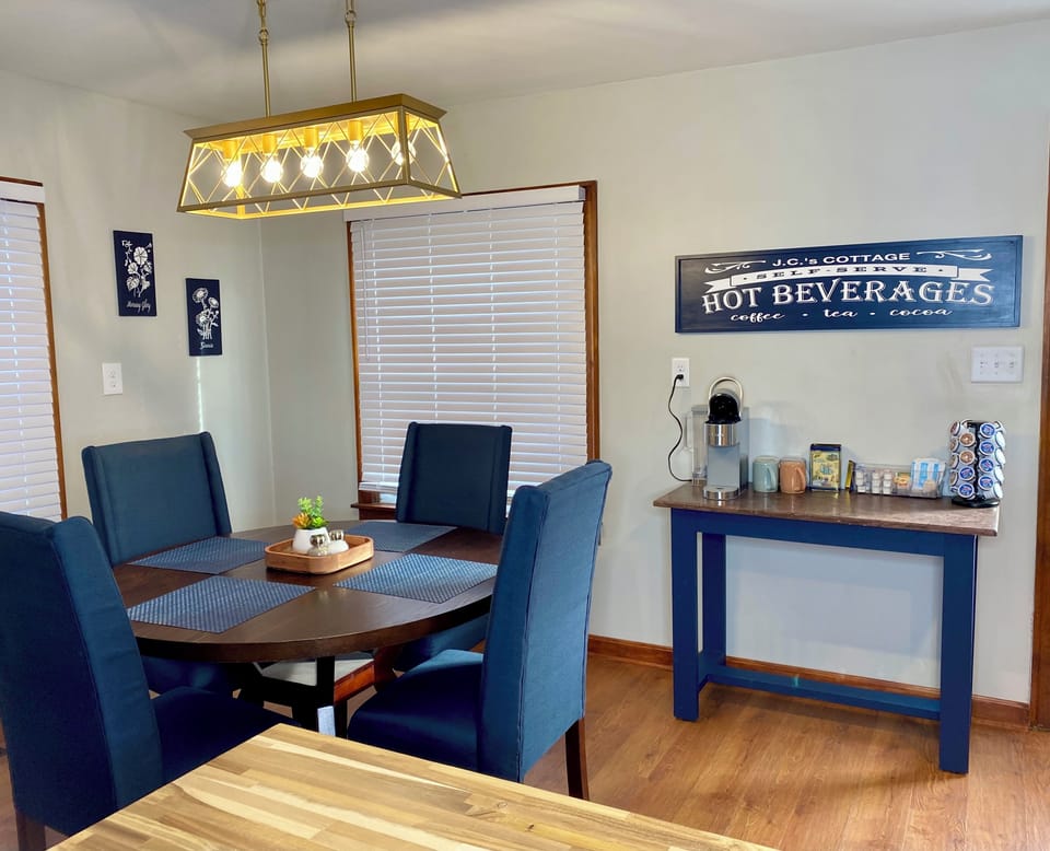 Seating for 4 guests, "Hot Beverage" bar with complimentary coffee and tea