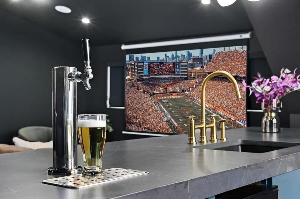 110 inch projector screen in your private lounge/bar that can be used to watch TV and connected to your laptop.