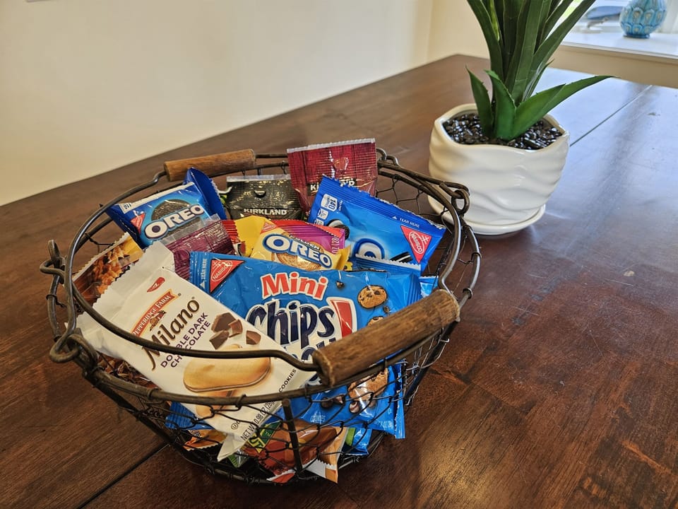 Enjoy the provided coffee, tea, and snacks.