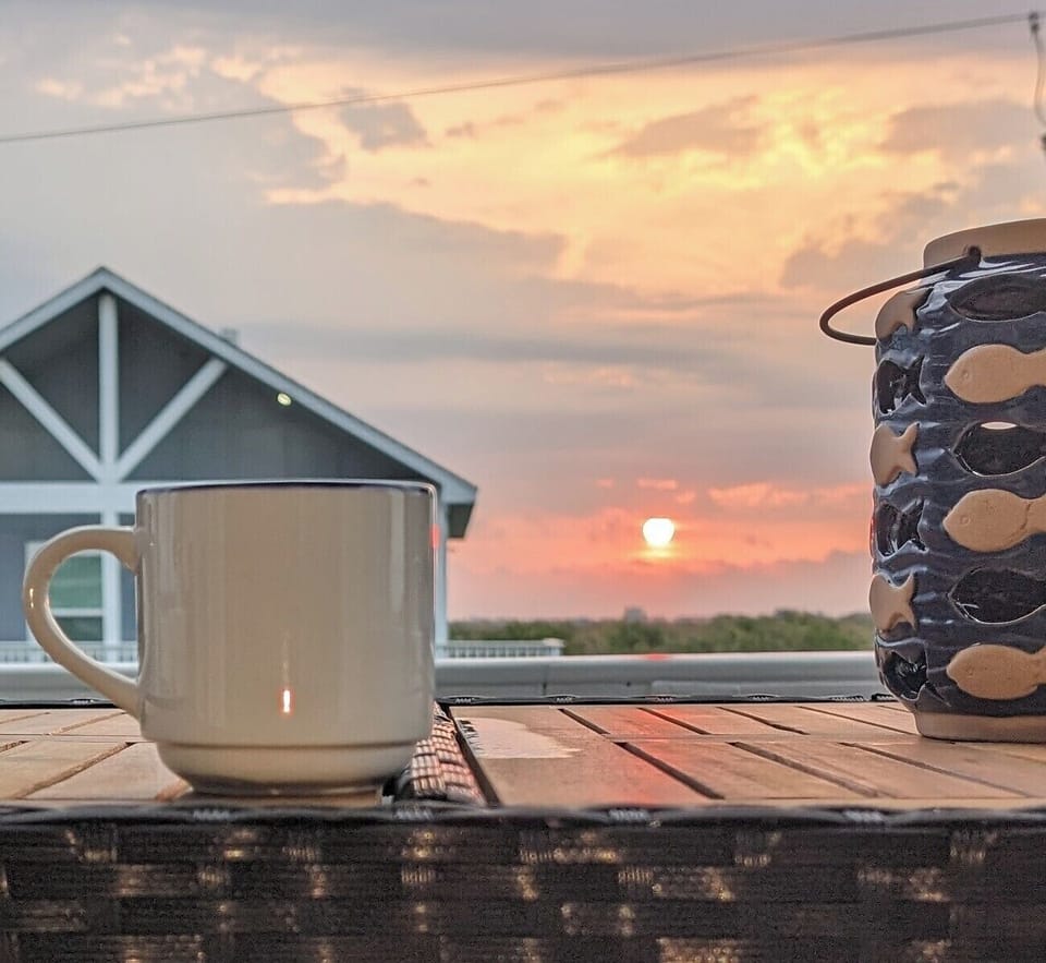 Coffee at sunrise on the top deck