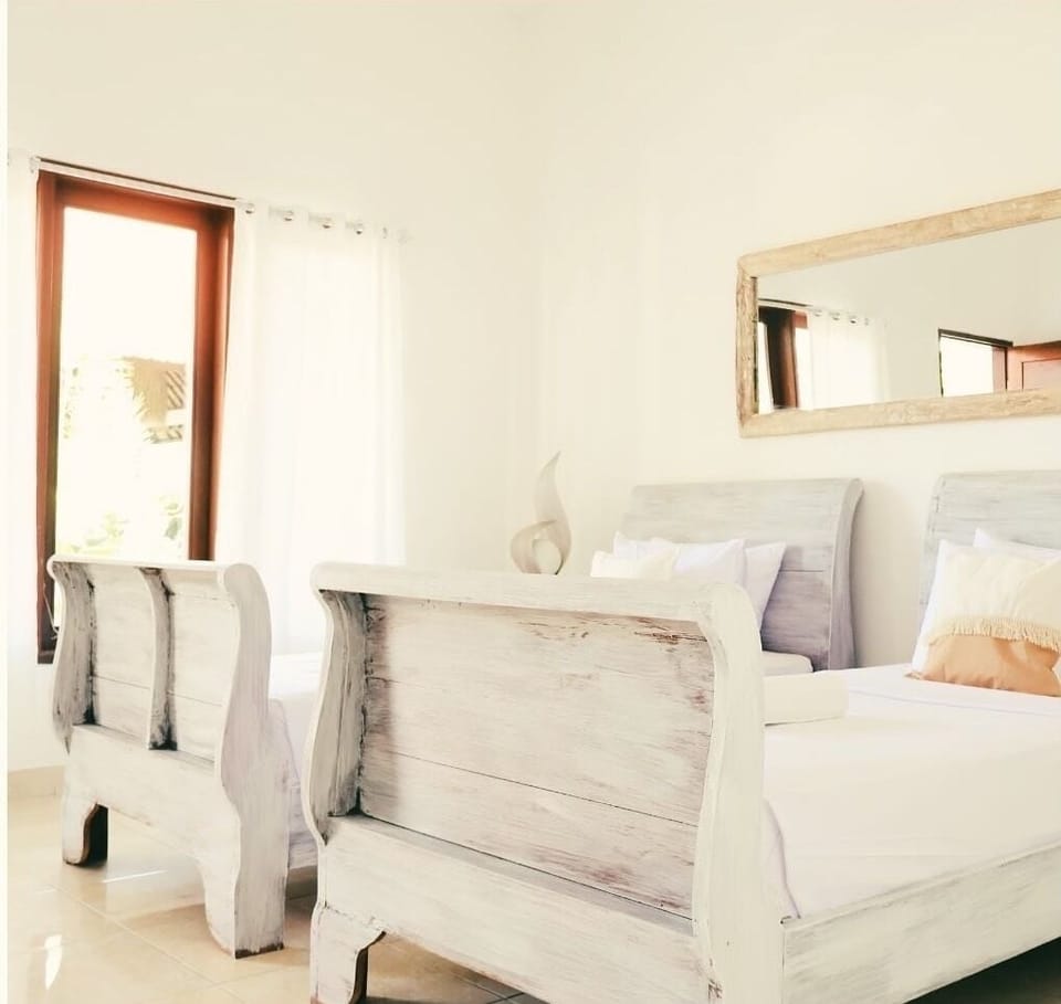 Standard Twin Room, Pool View | Minibar, in-room safe, individually decorated, desk