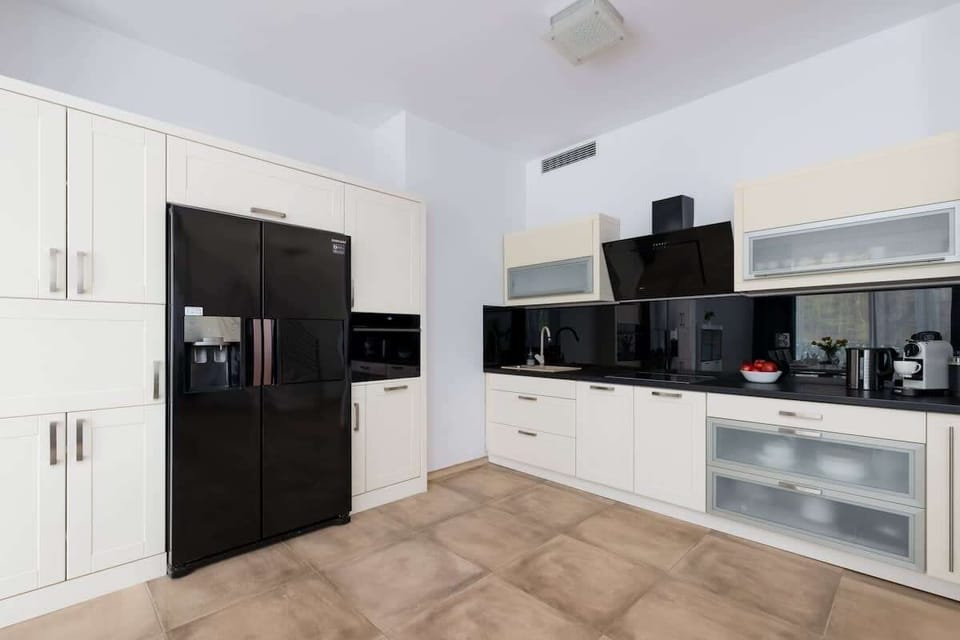 Kitchenette with a kettle.