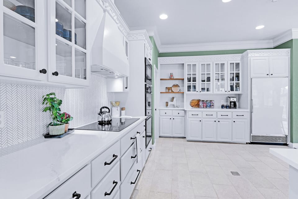 Ample storage and countertop space all throughout the kitchen