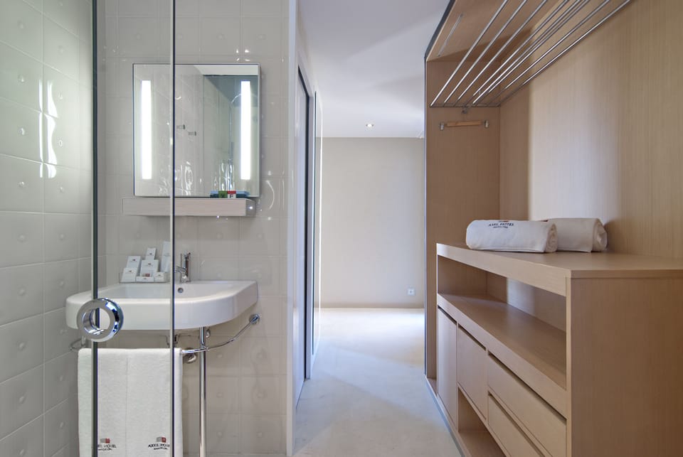 Shower, free toiletries, hair dryer, slippers