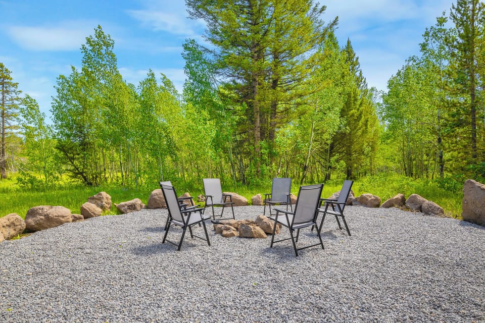 Outdoor fire pit located off the back deck