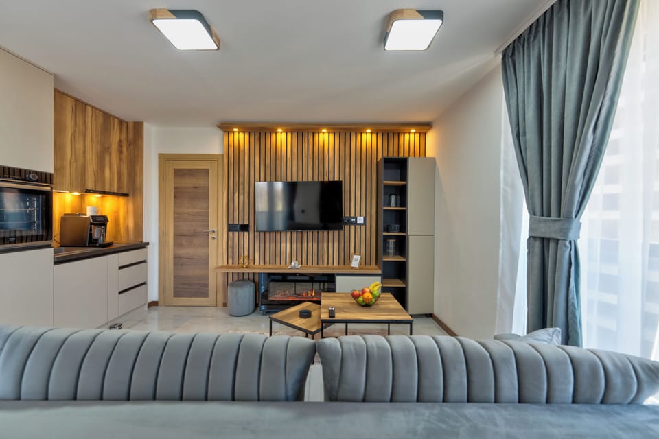 Executive Studio, Patio, Mountain View | Living area | 42-inch LCD TV with premium channels, heated floors