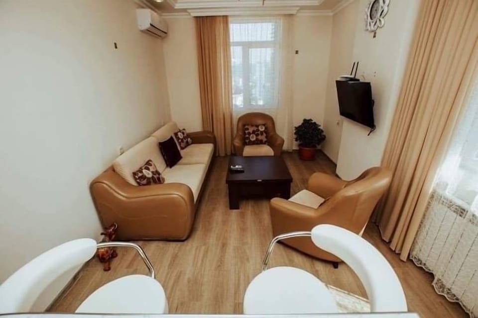 City Apartment | Living area | Flat-screen TV