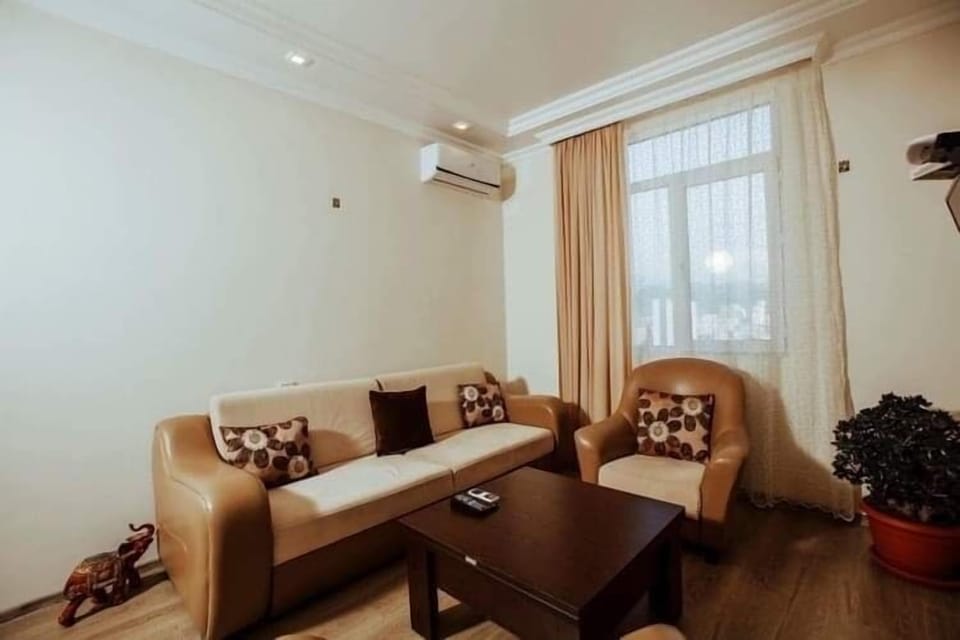 City Apartment | Living area | Flat-screen TV