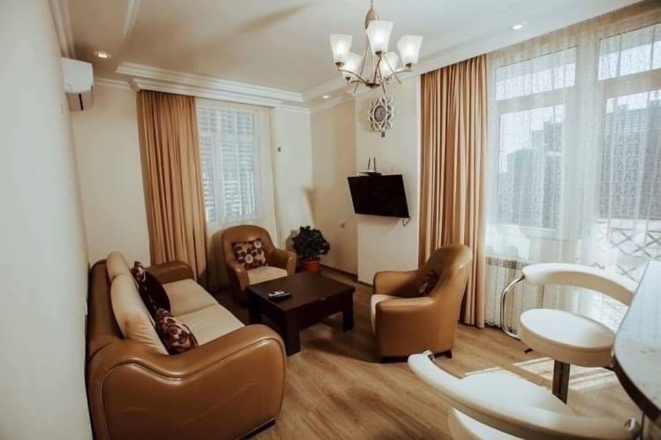 City Apartment | Living area | Flat-screen TV