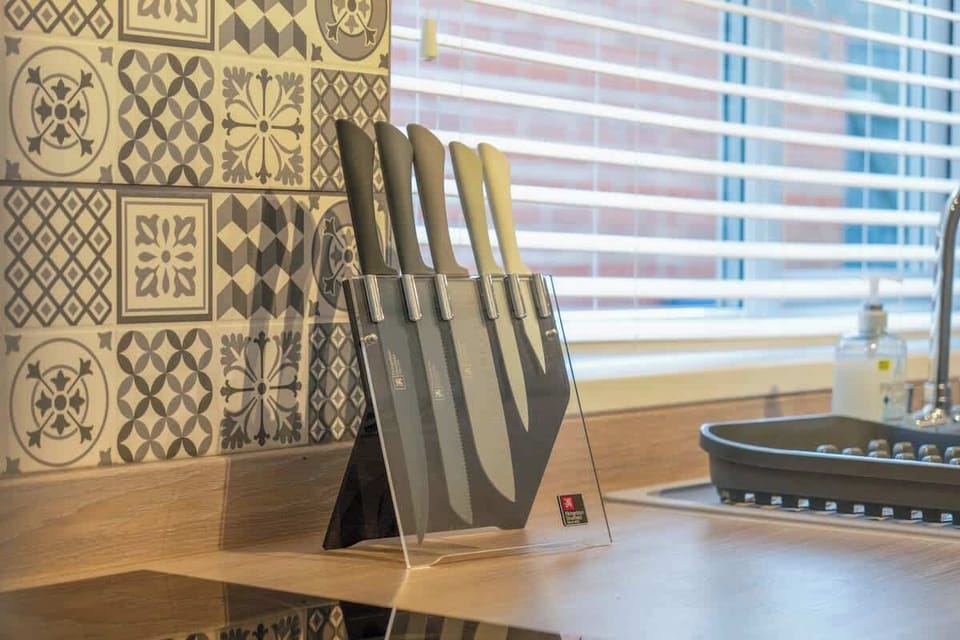 Kitchen equipped with all essentials, including a washer & dryer, oven, fridge and full cookware set. Also, the kitchen benefits from another 4-seater dining table. 