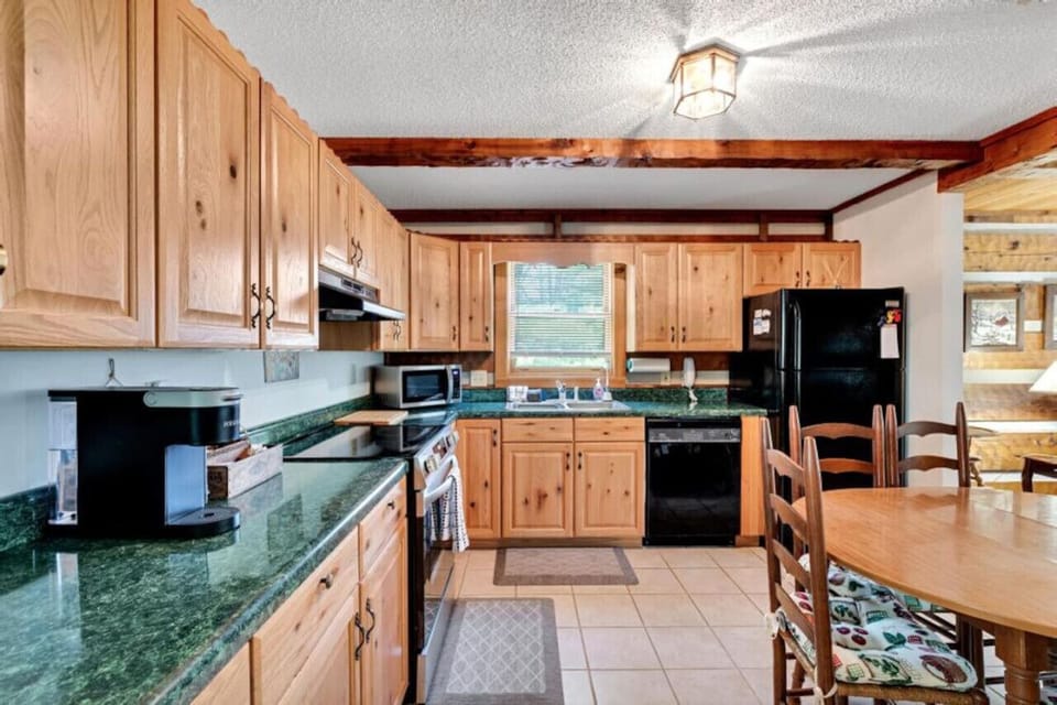 Prepare food with ease in your homes fully stocked kitchen