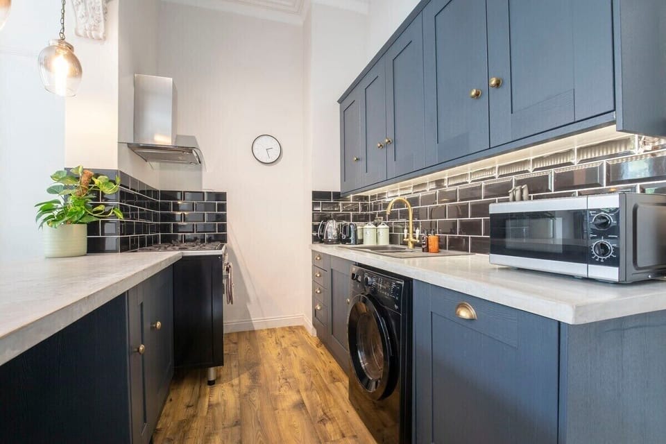 Kitchen with fridge and freezer, washing machine, dishwasher, toaster, kettle microwave and comes fully equipped.