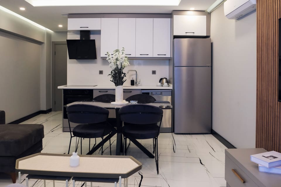 Family Suite, City View | Private kitchen | Fridge, oven, dishwasher