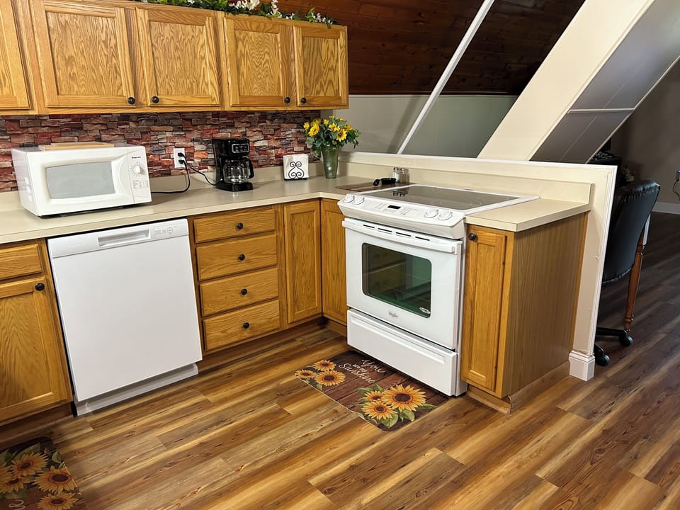 Furnished kitchen with dishwasher