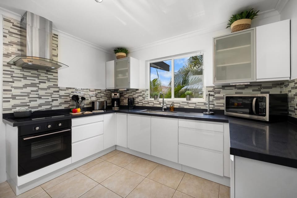 Whip up culinary delights in our spacious kitchen, equipped with modern appliances and ample counter space. Dining here is an experience to savor.
