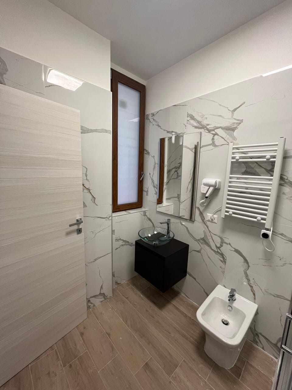 Deluxe Triple Room, City View | Bathroom | Shower, rainfall showerhead, hair dryer, bidet