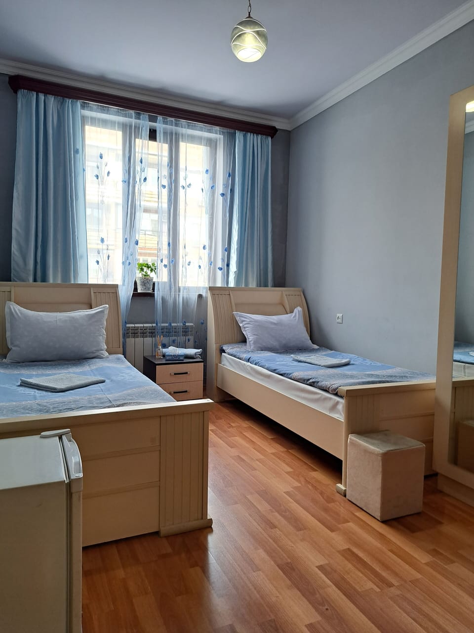 Double room with 2 separate beds shared bathroom | Iron/ironing board, free WiFi, bed sheets